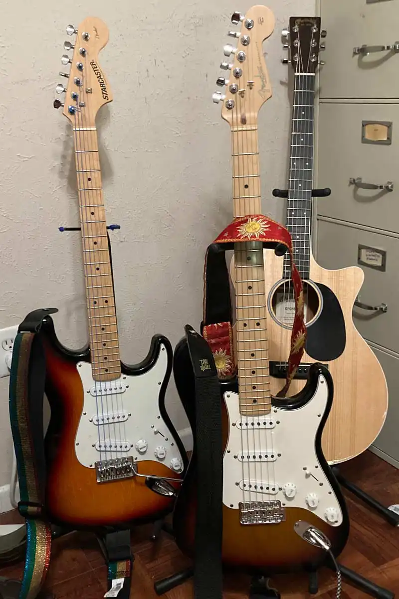 THree guitars in a corner